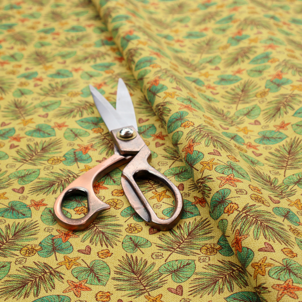 A dense, repeating tropical print on a yellow background featuring green palm fronds, heart-shaped leaves, orange starfish, and tiny sea shells.