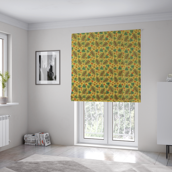 The fabric used to create these Roman blinds is a dense, repeating tropical print on a yellow background featuring green palm fronds, heart-shaped leaves, orange starfish, and tiny sea shells.
