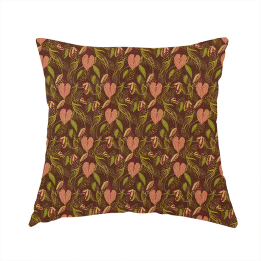 The fabric used to create this handmade cushion is a brown upholstery fabric featuring a repeating pattern of pink heart-shaped leaves, green foliage, and delicate botanical details.