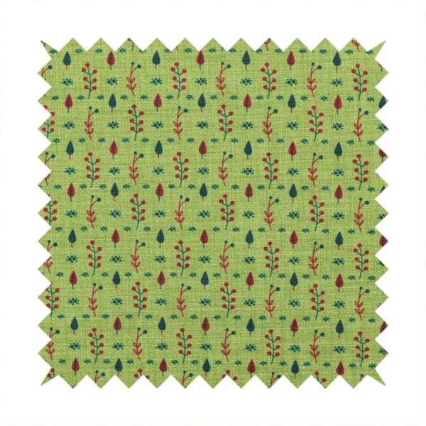 A green upholstery fabric featuring a ditsy folk-art pattern of small red berries, sprigs, and dark blue leaves.