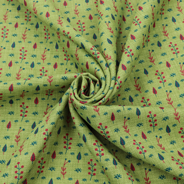 A green upholstery fabric featuring a ditsy folk-art pattern of small red berries, sprigs, and dark blue leaves.