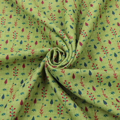 A green upholstery fabric featuring a ditsy folk-art pattern of small red berries, sprigs, and dark blue leaves.