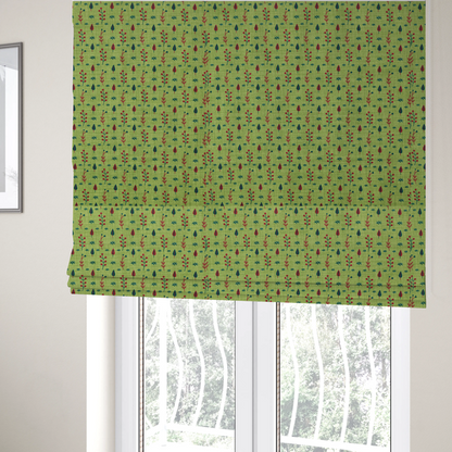 The fabric used to create these Roman blinds is a green upholstery fabric featuring a ditsy folk-art pattern of small red berries, sprigs, and dark blue leaves.