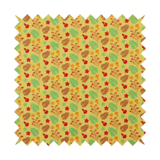 A yellow upholstery fabric featuring a vibrant tropical pattern of red, green, and brown leaves and flowers.