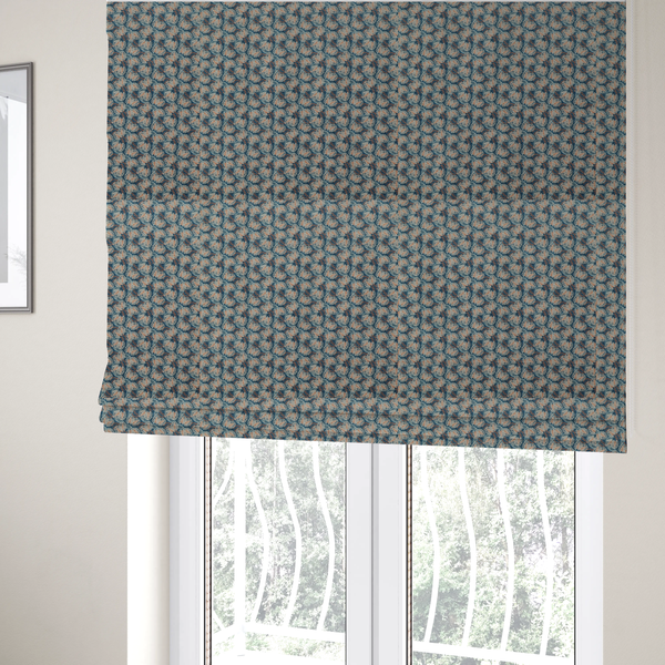 The fabric used to create these Roman blinds is a dark blue and slate textured fabric featuring a dense, repeating mosaic pattern of small tropical leaves in shades of cream and rust orange.