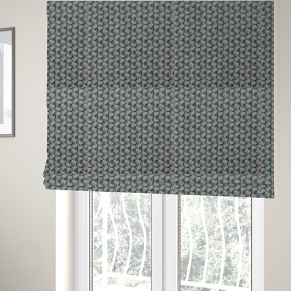 The fabric used to create these Roman blinds is a dark blue and slate textured fabric featuring a dense, repeating mosaic pattern of small tropical leaves in shades of cream and rust orange.
