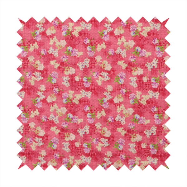 A vibrant raspberry pink fabric featuring a dense, repeating pattern of small white, purple, and green floral clusters over a subtle checked texture.