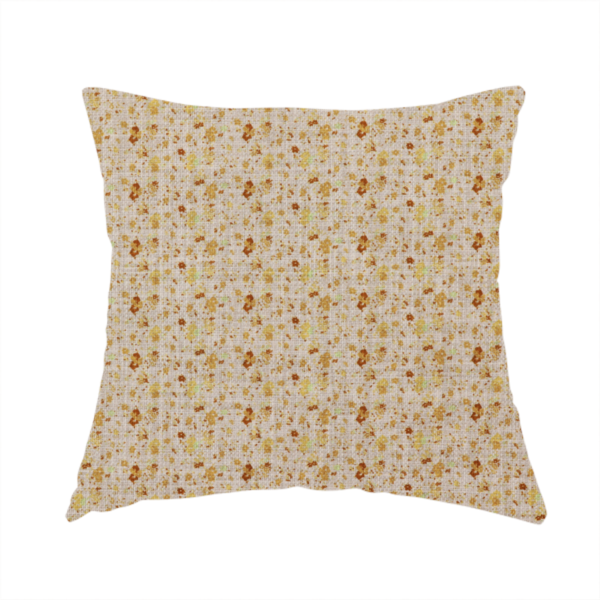 The fabric used to create this handmade cushion is a textured light beige or cream fabric featuring a dense repeating pattern of tiny gold, yellow, and brown micro flowers.