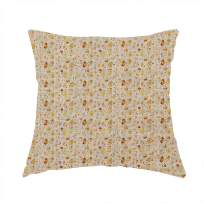 The fabric used to create this handmade cushion is a textured light beige or cream fabric featuring a dense repeating pattern of tiny gold, yellow, and brown micro flowers.