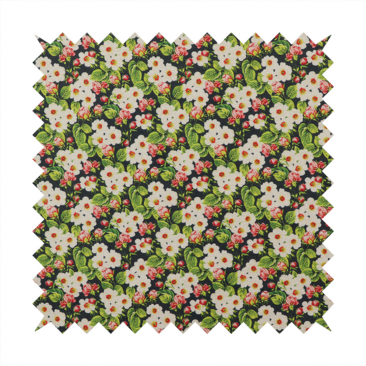 A dense vintage-style micro-floral print fabric featuring tiny white blossoms, pink buds, and green leaves set against a dark background.