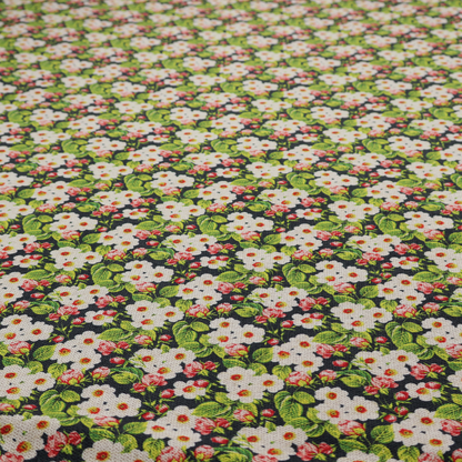 A dense vintage-style micro-floral print fabric featuring tiny white blossoms, pink buds, and green leaves set against a dark background.