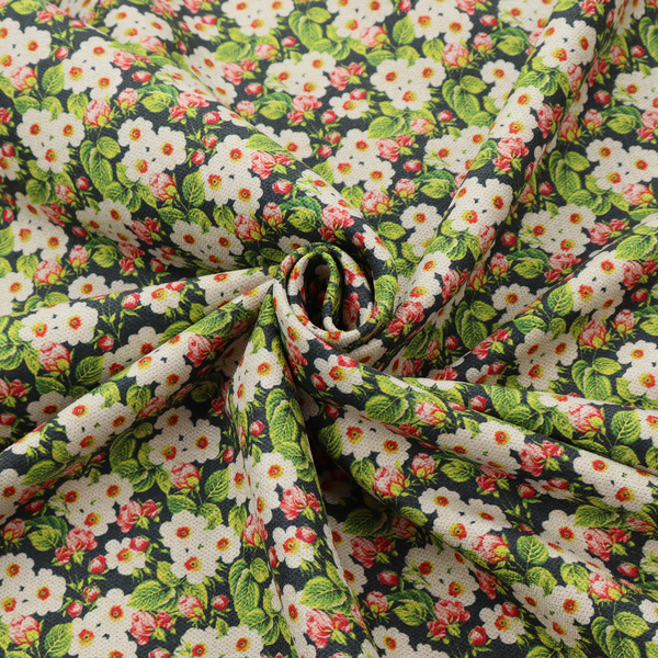 A dense vintage-style micro-floral print fabric featuring tiny white blossoms, pink buds, and green leaves set against a dark background.