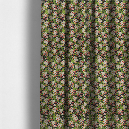The fabric used to create these made-to-measure curtains is a dense vintage-style micro-floral print fabric featuring tiny white blossoms, pink buds, and green leaves set against a dark background.
