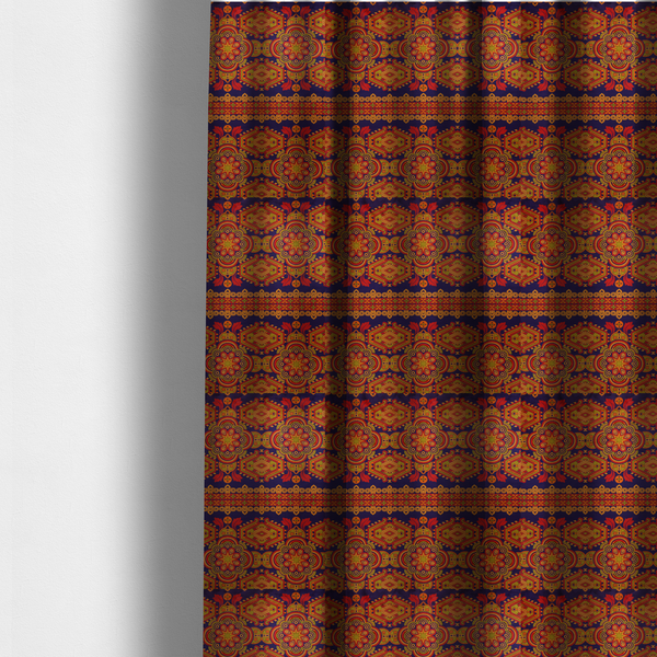 The fabric used to create these made-to-measure curtains is a deep purple textile adorned with intricate, ornate patterns including large mandala medallions, geometric motifs, and a central horizontal decorative stripe in shades of red, orange, and olive green.