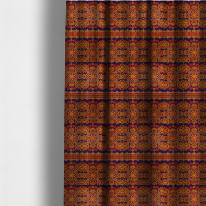 The fabric used to create these made-to-measure curtains is a deep purple textile adorned with intricate, ornate patterns including large mandala medallions, geometric motifs, and a central horizontal decorative stripe in shades of red, orange, and olive green.