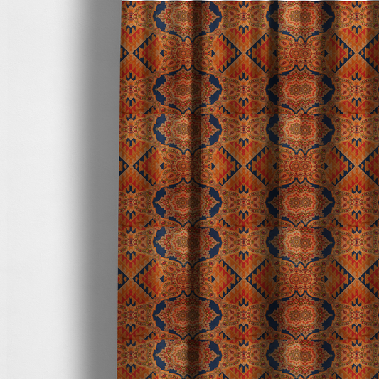 The fabric used to create these made-to-measure curtains is a large, diamond-shaped geometric centrepiece filled with fine diagonal lines and stair-step tribal or Aztec-inspired patterns in orange and dark blue.