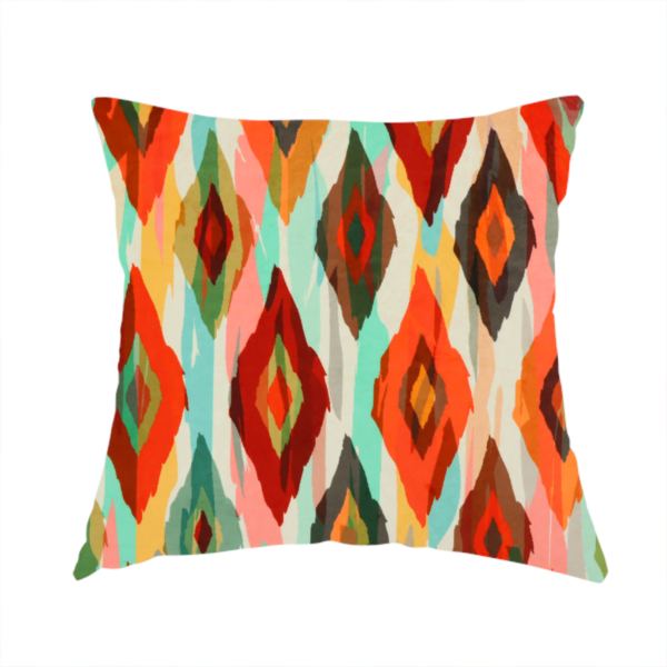 The fabric used to create this handmade cushion has staggered rows of watercolour-effect, multi-layered diamonds that create a dynamic, textured, and boho-chic visual flow.