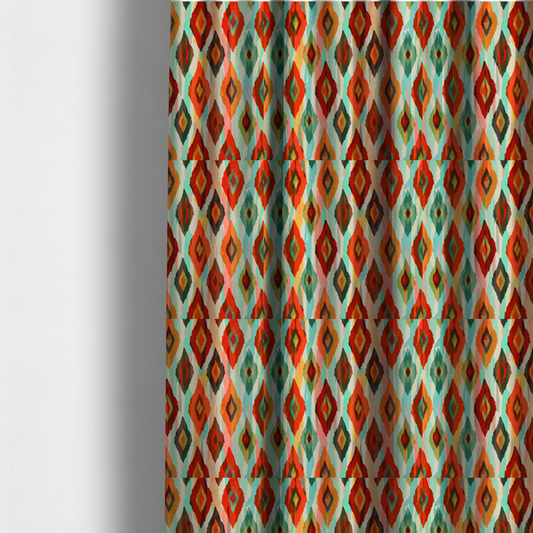 The fabric used to create these made-to-measure curtains is a staggered rows of watercolour-effect, multi-layered diamonds that create a dynamic, textured, and boho-chic visual flow.