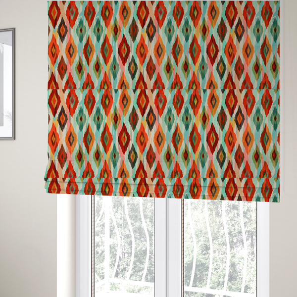 The fabric used to create these Roman blinds has staggered rows of watercolour-effect, multi-layered diamonds that create a dynamic, textured, and boho-chic visual flow.