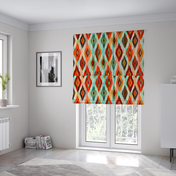 The fabric used to create these Roman blinds has staggered rows of watercolour-effect, multi-layered diamonds that create a dynamic, textured, and boho-chic visual flow.