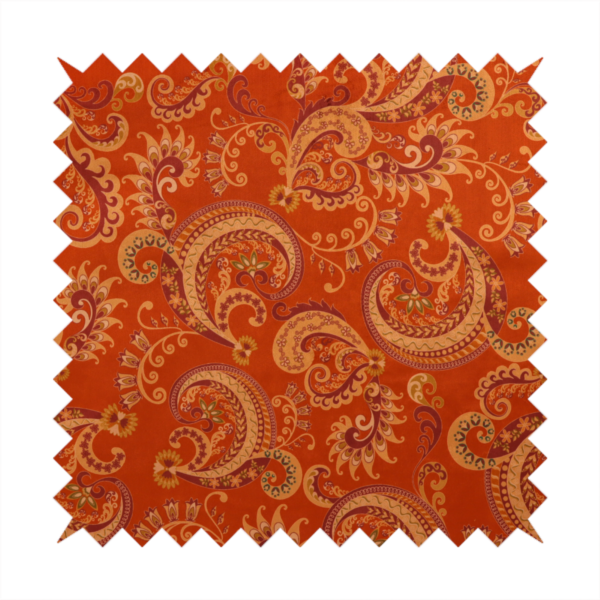 An elaborate, repeating paisley and baroque scroll design filled with swirling vines, teardrop shapes, and floral flourishes.
