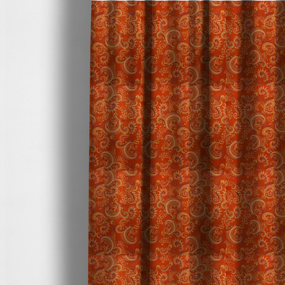The fabric used to create these made-to-measure curtains is an elaborate, repeating paisley and baroque scroll design filled with swirling vines, teardrop shapes, and floral flourishes.