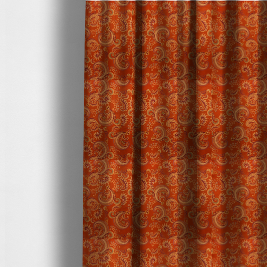 The fabric used to create these made-to-measure curtains is an elaborate, repeating paisley and baroque scroll design filled with swirling vines, teardrop shapes, and floral flourishes.