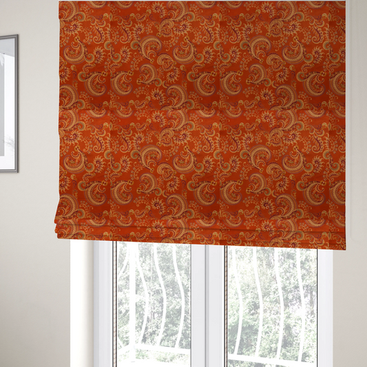 The fabric used to create these Roman blinds is an elaborate, repeating paisley and baroque scroll design filled with swirling vines, teardrop shapes, and floral flourishes.