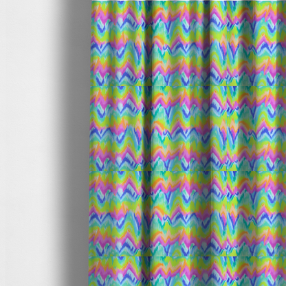 The fabric used to create these made-to-measure curtains is a high-energy neon mix of electric pink, bright lime green, vivid orange, turquoise, light blue, and deep purple.