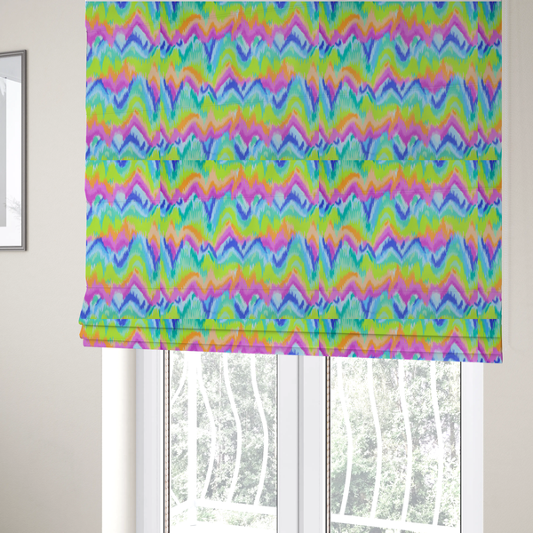 The fabric used to create these Roman blinds is a high-energy neon mix of electric pink, bright lime green, vivid orange, turquoise, light blue, and deep purple.