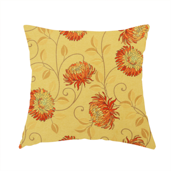 The fabric used to create this handmade cushion is a large, detailed chrysanthemum or dahlia-like blooms connected by slender, curving vines, delicate scrolling tendrils, and scattered leaf silhouettes.