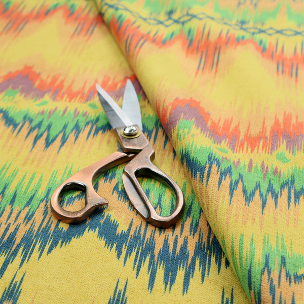 Horizontal bands of intricate, jagged zig-zags, flame-like vertical gradations, and a central diamond-patterned border stripe that mimic traditional ikat weaving.
