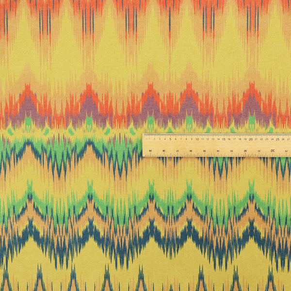 Horizontal bands of intricate, jagged zig-zags, flame-like vertical gradations, and a central diamond-patterned border stripe that mimic traditional ikat weaving.