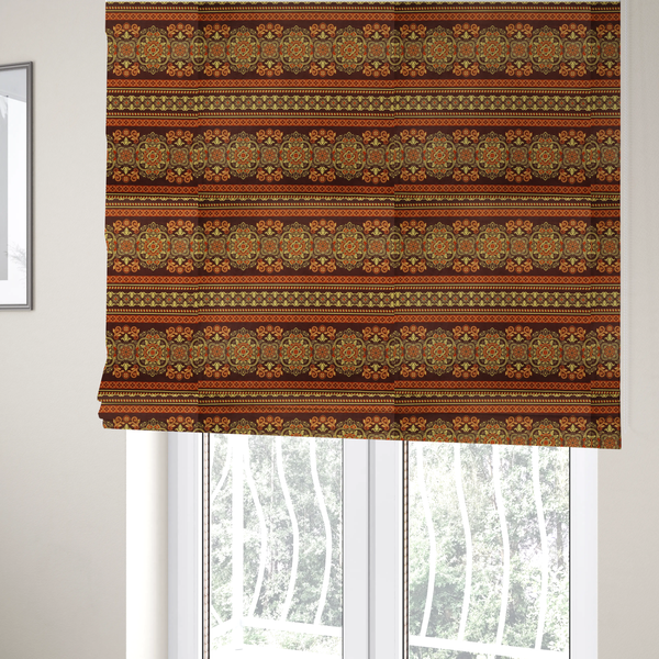 The fabric used to create these Roman blinds is an alternating horizontal rows featuring large, intricate damask or medallion roundels, smaller floral scrollwork, and geometric border stripes.