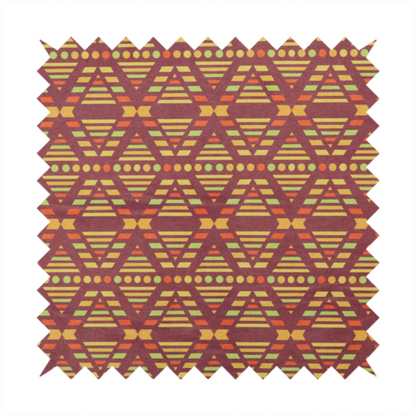 The image features a structured, geometric textile pattern with an Aztec-inspired aesthetic and repeated diamond motifs.