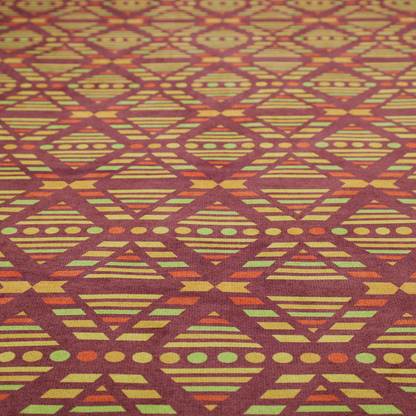 The image features a structured, geometric textile pattern with an Aztec-inspired aesthetic and repeated diamond motifs.