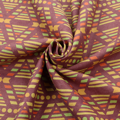 The image features a structured, geometric textile pattern with an Aztec-inspired aesthetic and repeated diamond motifs.