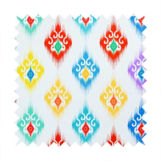 The image features a colourful, patterned textile with an ikat-style design and repeating diamond motifs.