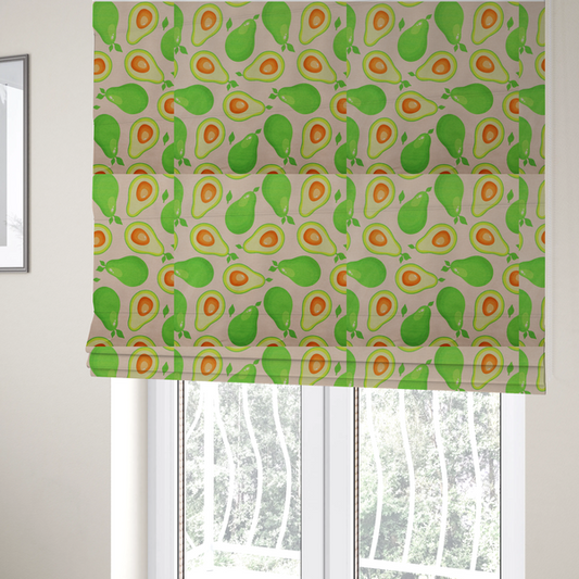 The fabric used to create these roman blinds is a repeating pattern fabric featuring whimsical illustrations of whole green avocados with small leaves and sliced avocado halves showing bright orange pits, all scattered across a light pink background.