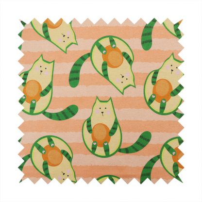 A playful repeating pattern fabric featuring whimsical illustrated "avocatos"—cats shaped like avocado halves with green striped tails and orange pits—over a light peach background with horizontal orange stripes.