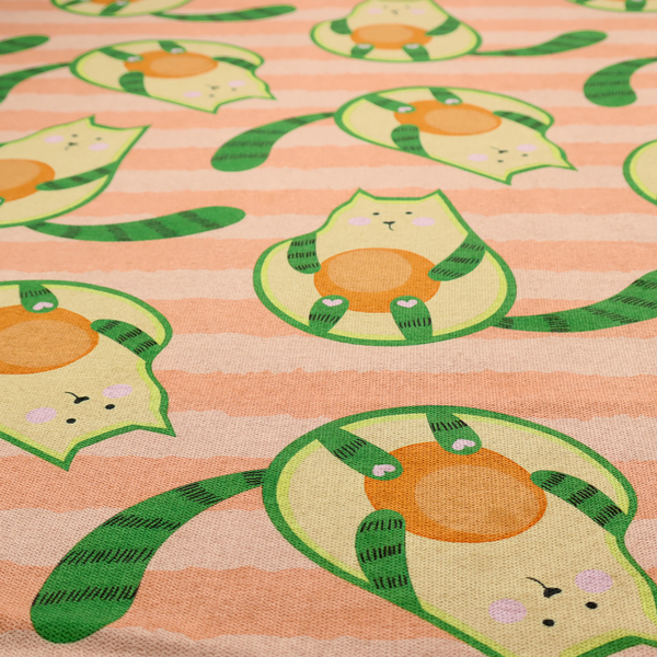 A playful repeating pattern fabric featuring whimsical illustrated "avocatos"—cats shaped like avocado halves with green striped tails and orange pits—over a light peach background with horizontal orange stripes.