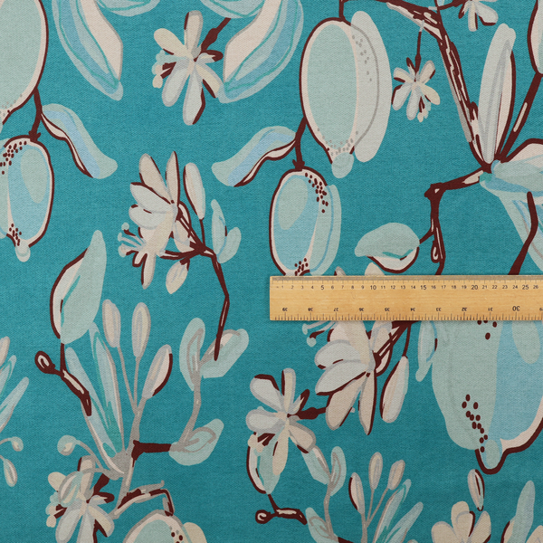 A botanical fabric design with trailing branches adorned with oval citrus fruit motifs, leaves, and small blossoms.