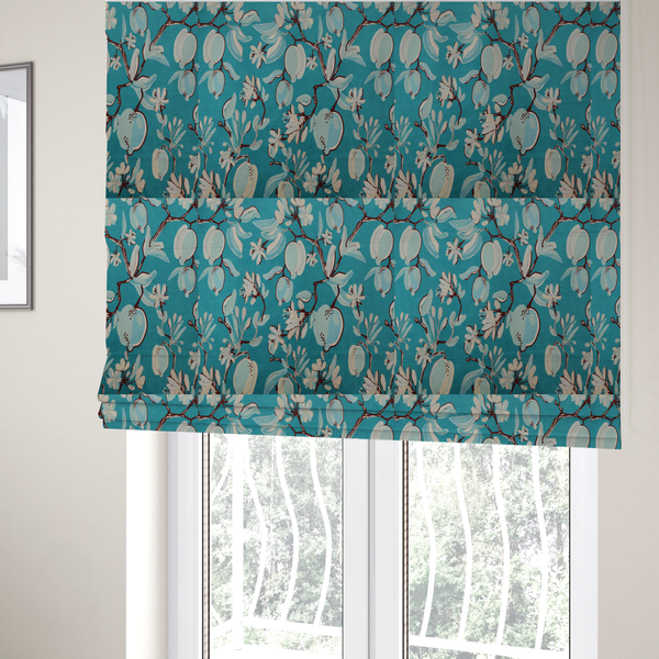 The fabric used to create these Roman blinds is a botanical fabric design with trailing branches adorned with oval citrus fruit motifs, leaves, and small blossoms.