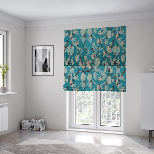 The fabric used to create these Roman blinds is a botanical fabric design with trailing branches adorned with oval citrus fruit motifs, leaves, and small blossoms.