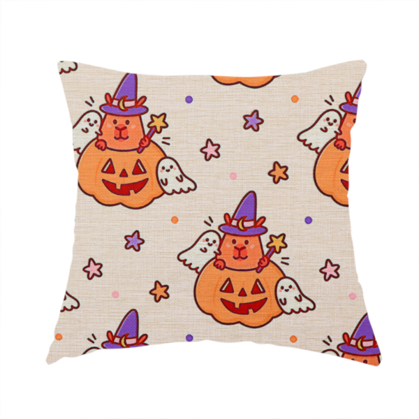 The fabric used to create this handmade cushion is a seamless, repeating Halloween-themed pattern featuring cute capybaras dressed as witches with purple hats and holding magic star wands, peeking out of carved jack-o'-lantern pumpkins, accompanied by friendly little ghosts, orange and purple stars, and polka dots on a light fabric-textured background.
