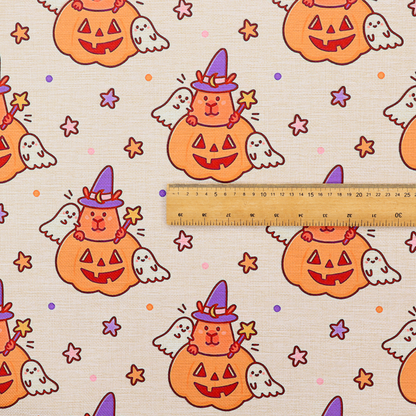 A seamless, repeating Halloween-themed pattern featuring cute capybaras dressed as witches with purple hats and holding magic star wands, peeking out of carved jack-o'-lantern pumpkins, accompanied by friendly little ghosts, orange and purple stars, and polka dots on a light fabric-textured background.