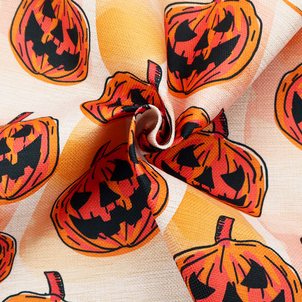 A seamless, repeating Halloween-themed pattern featuring vibrant orange carved jack-o'-lantern pumpkins with bold, black spooky expressions and lined details set against an abstract geometric orange and cream background.