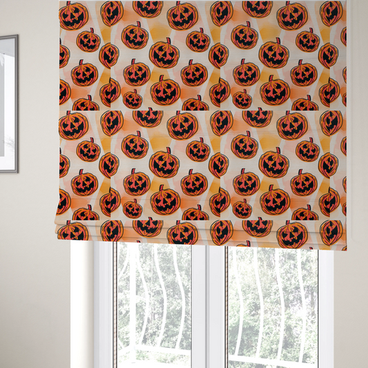 The fabric used to create these Roman blinds is a seamless, repeating Halloween-themed pattern featuring vibrant orange carved jack-o'-lantern pumpkins with bold, black spooky expressions and lined details set against an abstract geometric orange and cream background.