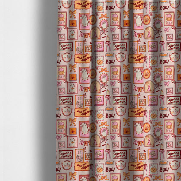 The fabric used to create these made-to-measure curtains is a seamless, repeating Halloween-themed pattern featuring a pink gallery wall filled with framed art, including cute ghosts, stacked pumpkins, a witch hat, a "Spooky Season" sign, bats, mushrooms, bows, spiderwebs, candles, and a skeletal peace sign hand on a light pink textured background.