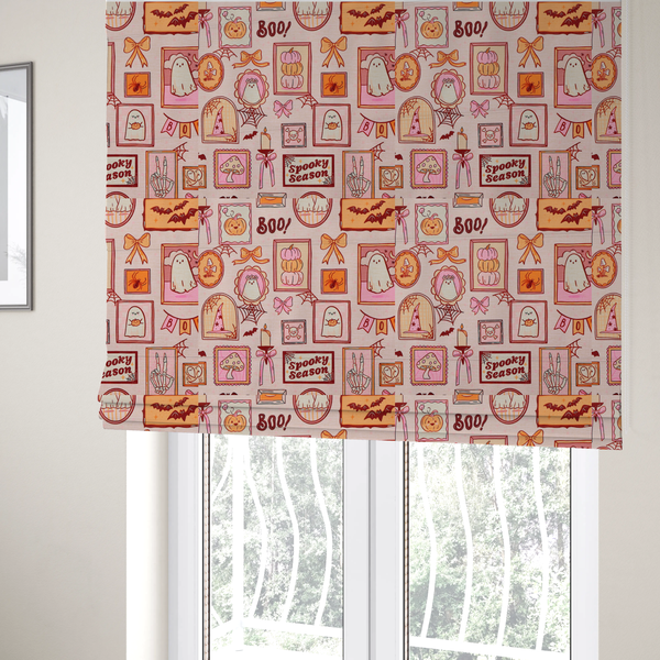 The fabric used to create these Roman blinds is a seamless, repeating Halloween-themed pattern featuring a pink gallery wall filled with framed art, including cute ghosts, stacked pumpkins, a witch hat, a "Spooky Season" sign, bats, mushrooms, bows, spiderwebs, candles, and a skeletal peace sign hand on a light pink textured background.